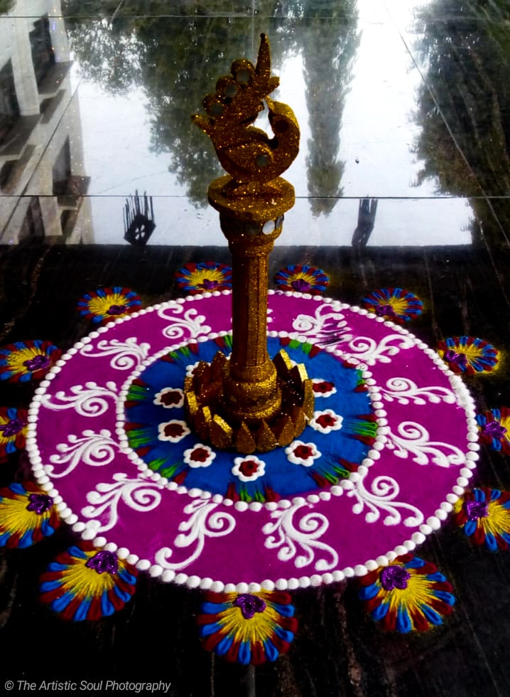 A light lamp decorated by colorful rangoli