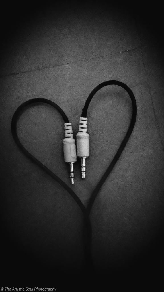 Love symbol made from headphones