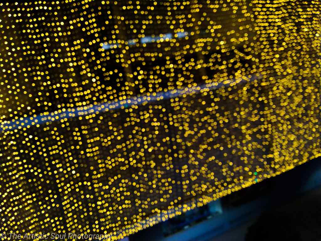 A blurry image of illuminated building