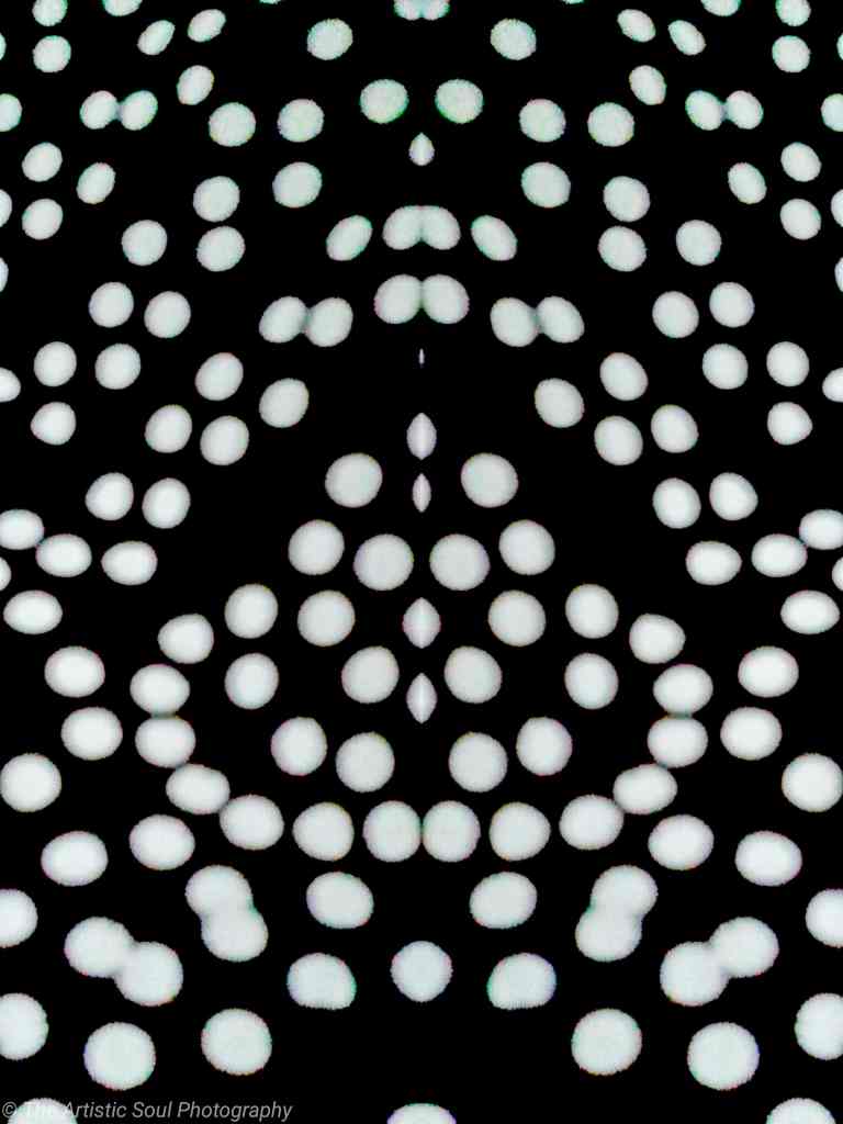 Mirror Image Black and White Photo of Polka Dots