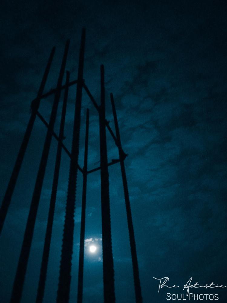 Full moon observed through the Iron Rods