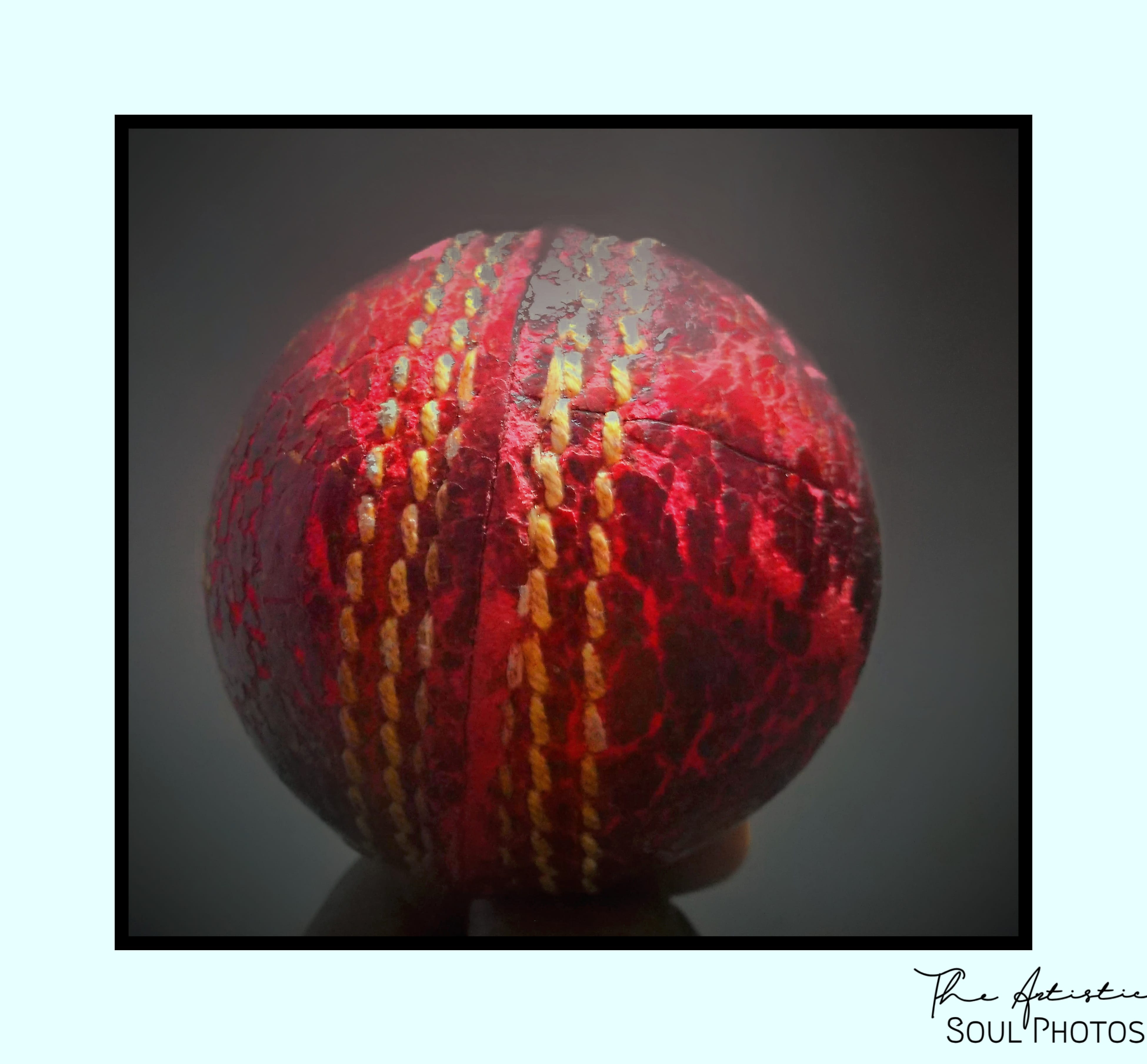 A Red Leather Cricket Ball